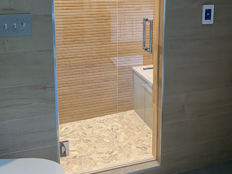 Stunning Steam Shower Design Using Soho Studio Tiles in Master Bathroom